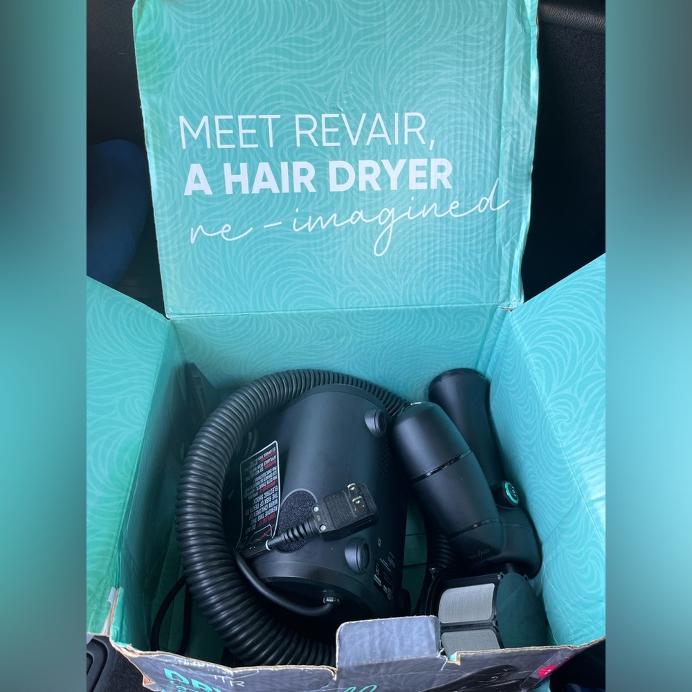 Brand new RevAir ReverseAir hairDryer. The newest version,black & turquoise one